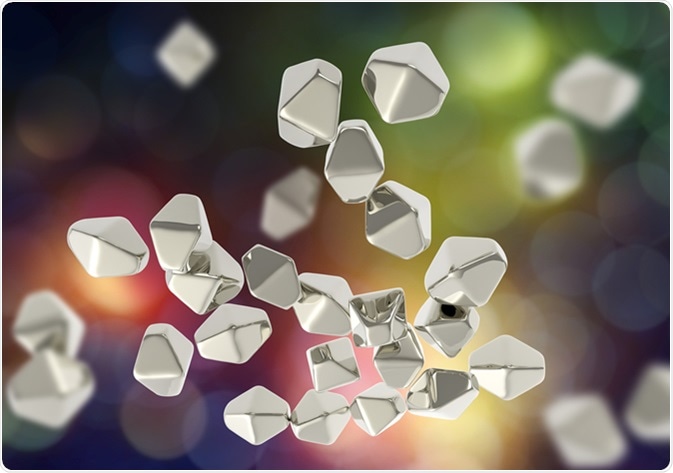 Titanium dioxide TiO2 nanoparticles, 3D illustration. TiO2 nanoparticles have shape of hexagonal crystals, they are used in medicine, chemistry, cosmetics, paper industry.  Image Credit: Kateryna Kon / Shutterstock