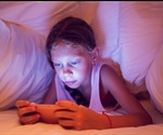 Children should not be allowed smartphones in bed or at mealtimes, say experts