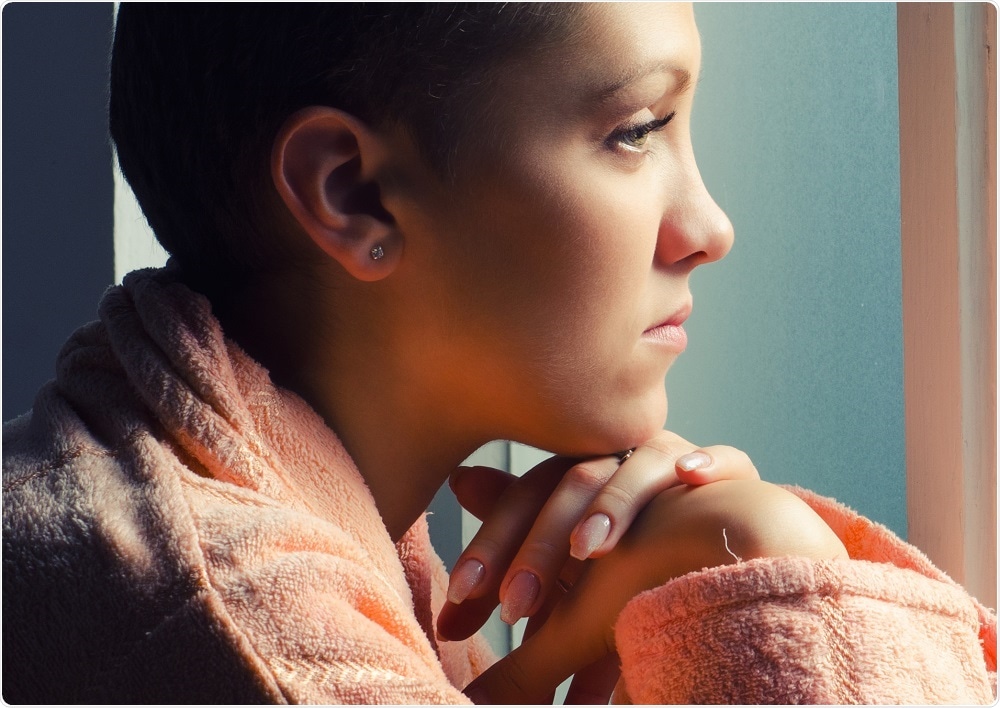 Person looking out of window