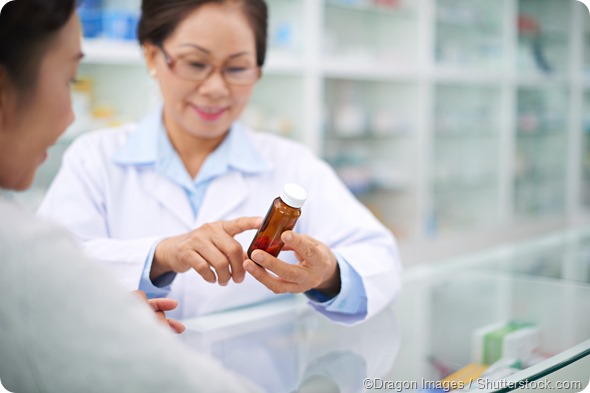Pharmacist helping patient
