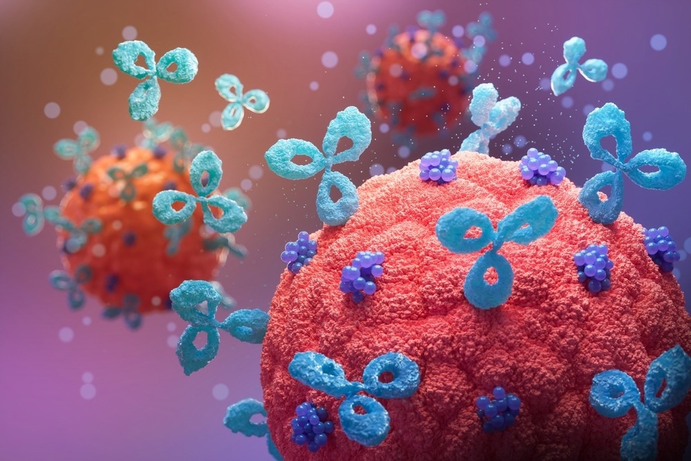 igital rendering of antibodies (blue) attaching to the surface of viral particles (red and orange), representing the immune system