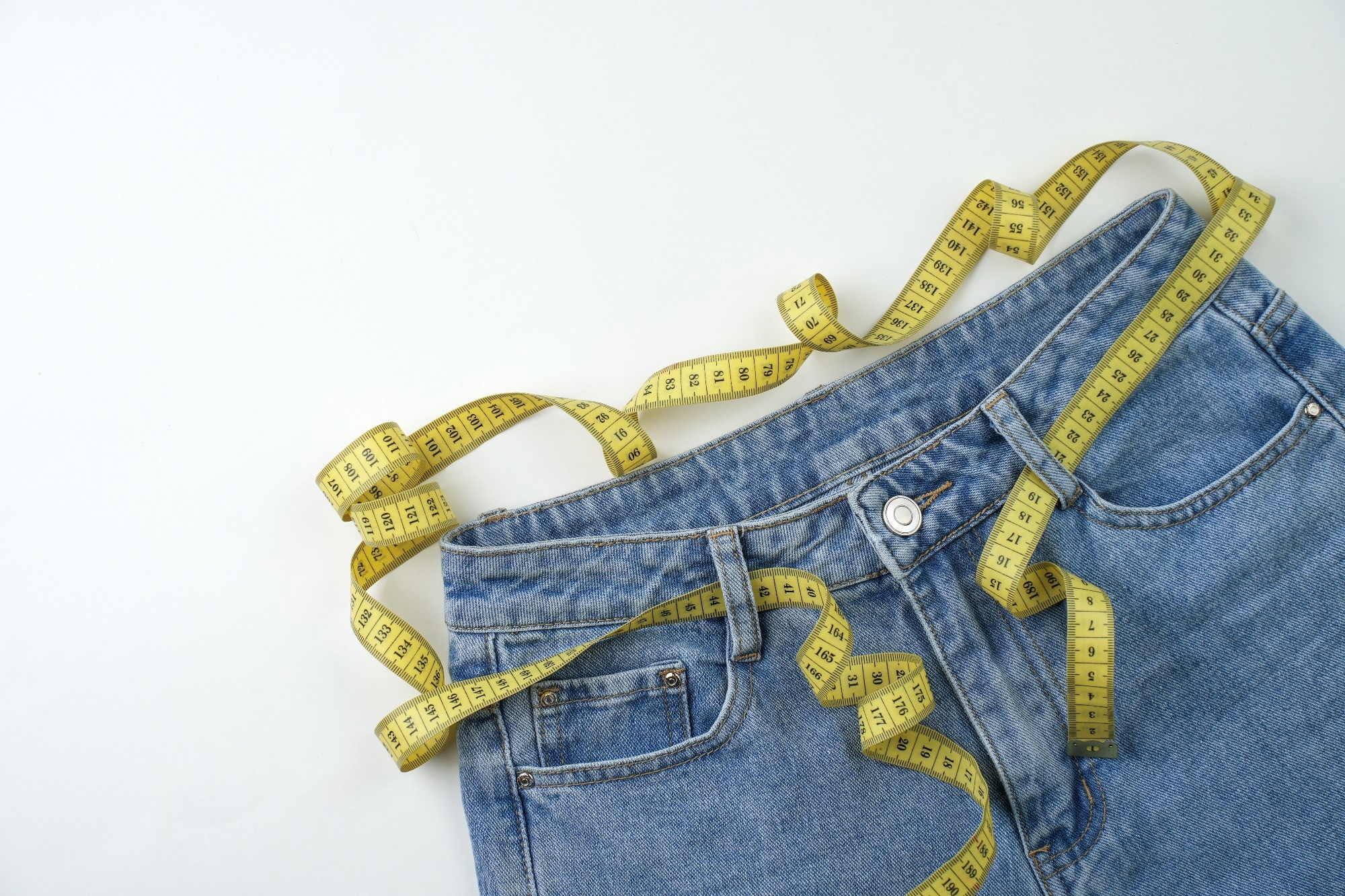 Jeans and measuring tape