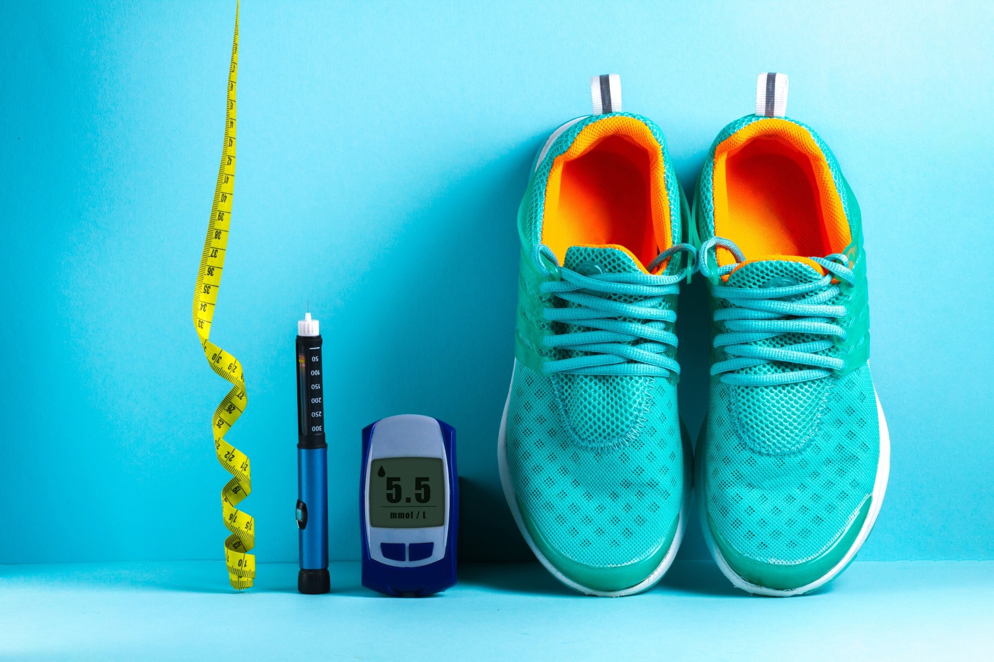 tape measure, diabetes insulin needle, glucometer and running shoes